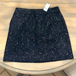 Navy blue mini skirt with sequins. Size 4P. Perfect for the holidays.